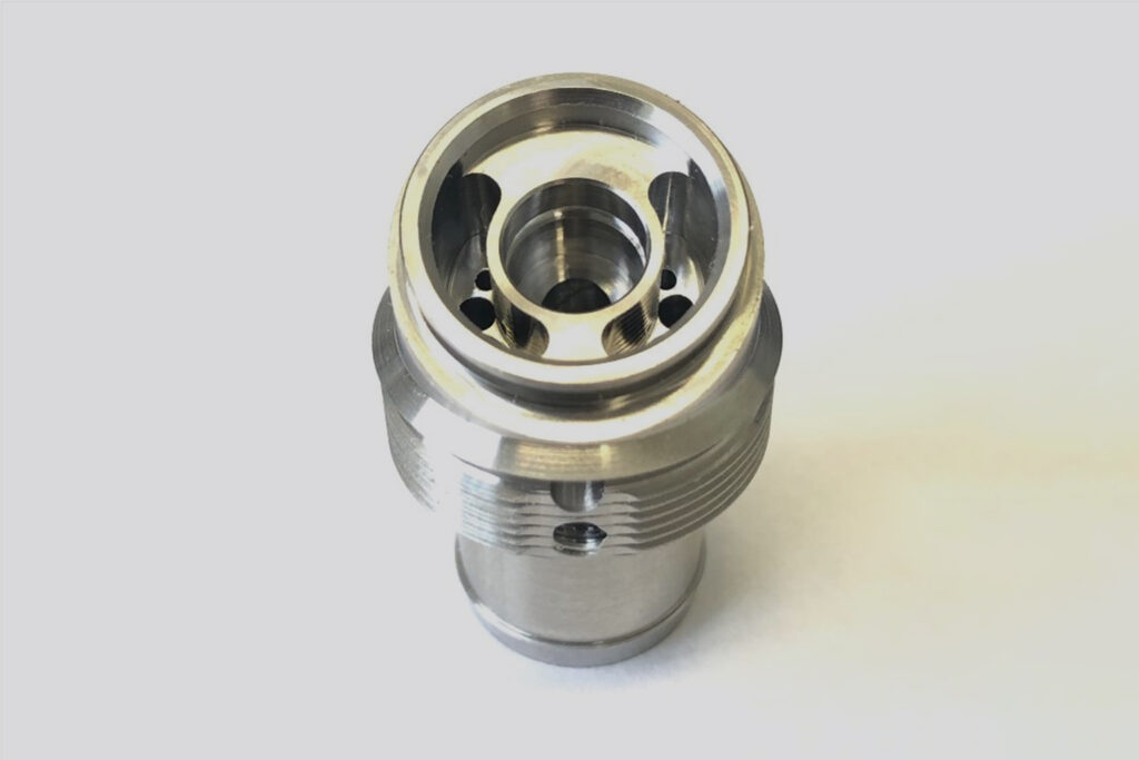 Precision multi-axis swiss machining